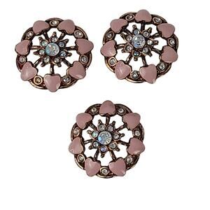 Three large pink enamel aurora borealis rhinestone shank metal buttons